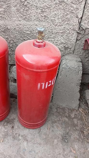газ пропан купить: Газовый баллон красного цвета с вентилем. - Тип: баллон для — 1