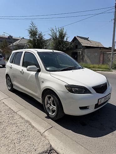 спойдер: Mazda Demio: 2002 г., 1.5 л, Автомат, Бензин, Хэтчбэк — 4