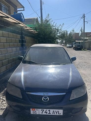 mazda 2: Mazda 323: 2001 г., 1.6 л, Механика, Бензин, Хэтчбэк — 2