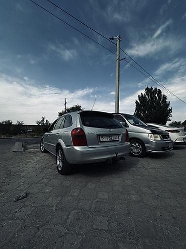 mc 2000: Mazda Familia: 2003 г., 1.6 л, Механика, Бензин, Хэтчбэк — 2