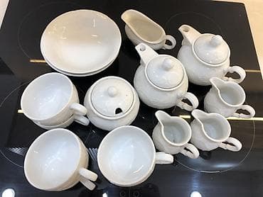 Дом и сад: Фарфоровый чайно-кофейный сервиз белого цвета с рельефным барочным — 4