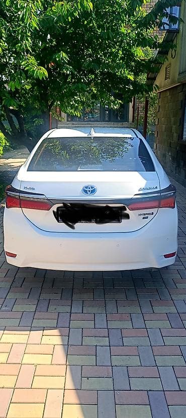 Toyota Corolla: 2019 г., 1.8 л, Автомат, Гибрид, Седан — 4