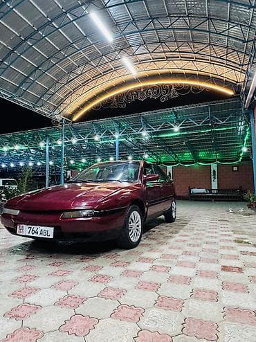 lancer 9: Mazda 323: 1994 г., 1.6 л, Механика, Бензин, Лифтбек — 3