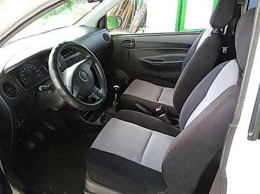 юта 704: Daihatsu Cuore: 2004 г., 1 л, Механика, Бензин, Хэтчбэк — 4