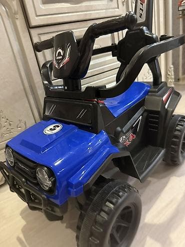 skillmax icon: Детская каталка-толокар в виде внедорожника 4x4. Яркая модель в синем — 2