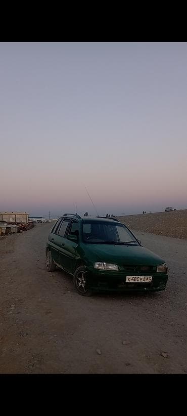 крыло демио: Mazda Demio: 1998 г., Хэтчбэк — 4