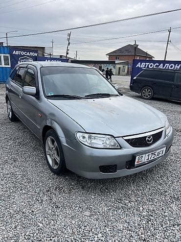 запчаст газ 66: Mazda 323: 2002 г., 1.6 л, Бензин — 1