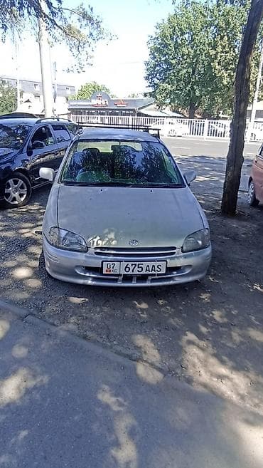 Toyota Starlet: 1998 г., 1.3 л, Автомат, Бензин, Хэтчбэк — 1