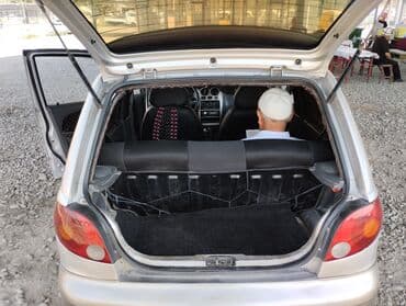 зимный шыны: Хэтчбек Daewoo Matiz серого цвета с четырьмя дверями и компактным — 6