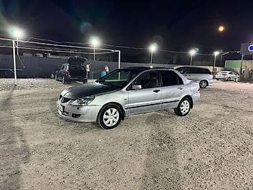 кира: Mitsubishi Lancer: 2004 г., 1.6 л, Автомат, Бензин, Седан — 3