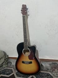 полуакустическая электрогитара: Акустическая гитара Memphis - Корпус типа дредноут с вырезом — 2