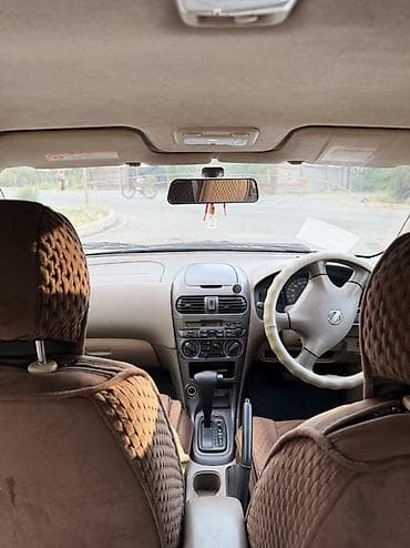 byd plus: Nissan Sunny: 2004 г., 1.5 л, Автомат, Бензин, Седан — 7