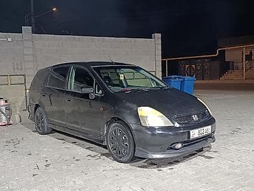 на вариант: Honda Stream: 2003 г., 2 л, Автомат, Бензин, Минивэн — 2