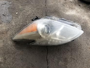 Рулевая часть: Передняя левая фара Toyota — 1