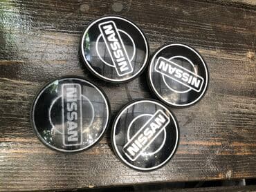 Продаю колпачки для дисков Ниссан. Диаметр 57 мм, оригинал