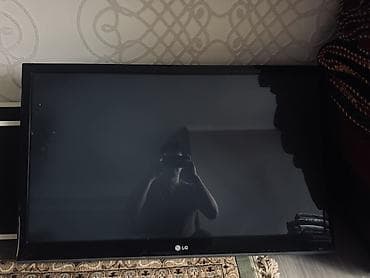 xbox microsoft: Телевизор LG, диагональ около 40–43". Классический черный корпус — 2