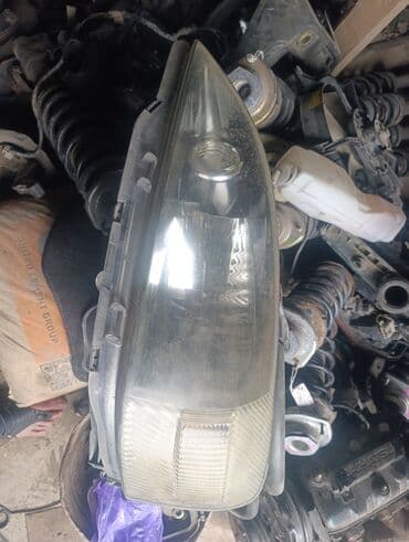 Передняя левая фара Daihatsu 2003 г., Б/у, Оригинал, Япония at lalafo.kg Передняя левая фара Daihatsu 2003 г., Б/у, Оригинал, Япония