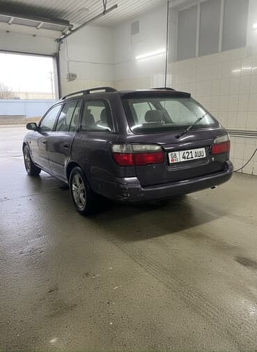 дом на обмен: Mazda Familia: 1998 г., Универсал — 1