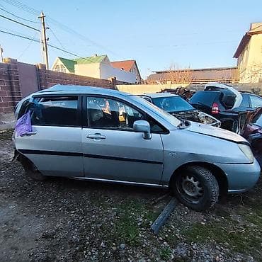 зузуки лиана: Suzuki Liana, серебристый хэтчбек/седан (KG номера 06 • 136 APV) — 4