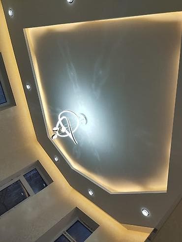 Укладка плитки: Дизайнерские потолки из гипсокартона с встроенной подсветкой - — 4