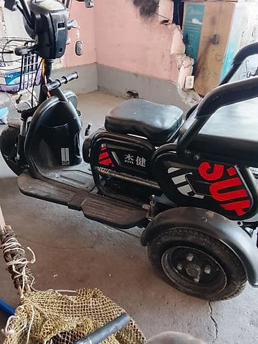 электрокар взрослый: Электрический трёхколёсный скутер (трицикл) с двумя рядами сидений. 48 — 7