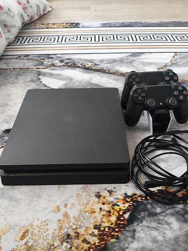 game controller: PlayStation 4 Slim (черная) Комплектация: - консоль PS4 Slim - 2 — 2