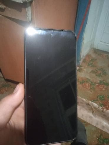 am 4: Смартфон с большим безрамочным дисплеем и фронтальной камерой в — 1