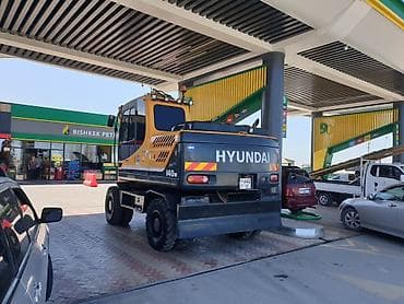 jon deer: Экскаватор, Hyundai, Колесный — 2