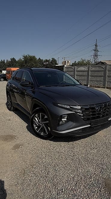 byd e1: Hyundai Tucson: 2022 г., 1.6 л, Автомат, Гибрид, Кроссовер — 1
