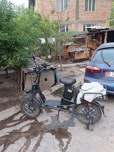 Электрический скутер (городской/карго-тип) Описание и особенности: -