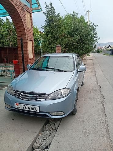 машина чанган фото цена: Легковой автомобиль седан, светло‑голубой цвет кузова. Передний — 1