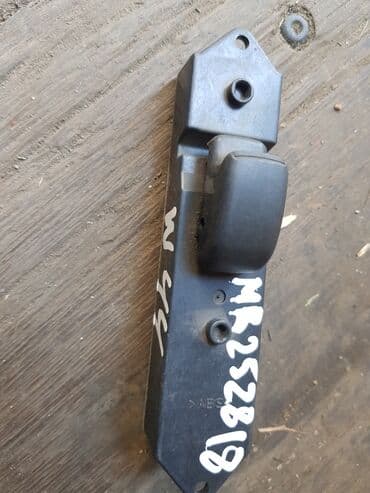 доводчик стекол: Mitsubishi Pajero, кнопка стеклоподьемника. Митсубиси Паджеро — 1