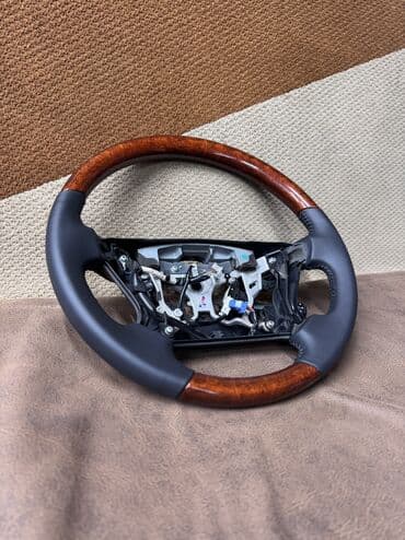 ремонт меховых изделий: Перетяжка Рулей,ручек кпп, юбочки кпп и ручного тормоза,подлокотников — 22