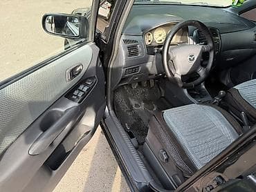 Унаа: Mazda PREMACY: 2004 г., 1.8 л, Кол менен иштөөчү, Бензин, Универсал — 9