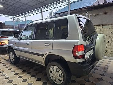 горный: Mitsubishi Pajero iO: 2001 г., 2 л, Автомат, Бензин, Внедорожник — 4