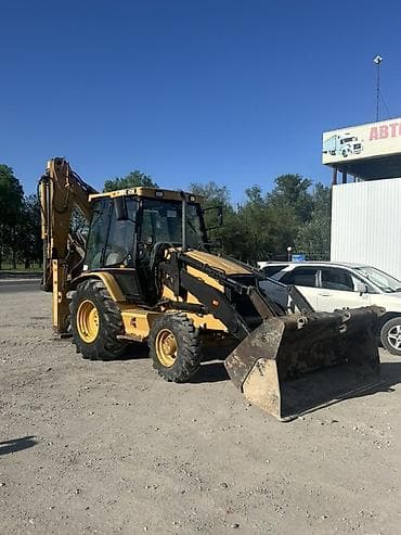 Экскаватор, Caterpillar, Колесный — 2