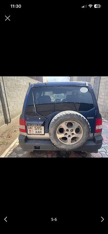 lada 2112: Mitsubishi Pajero iO: 1998 г., Автомат, Бензин, Внедорожник — 2