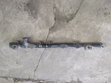 ремонт радиаторов охлаждения автомобилей: Toyota Carina E Бачок радиатора, Тойота Карина Бачок радиатора НИЖНИЙ — 1