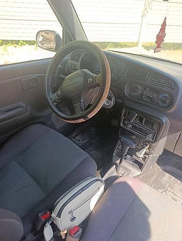кводроцикл мото: Daihatsu Cuore: 2001 г., 0.1 л, Автомат, Бензин, Хэтчбэк — 2