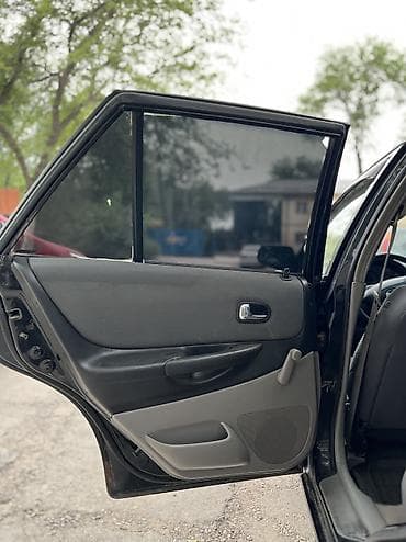 продам мазда 323: Mazda 323: 2002 г., 1.3 л, Механика, Бензин, Хэтчбэк — 8
