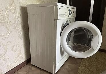 Стиральная машина LG, фронтальная загрузка. Домашняя работает хорошо