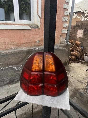 Глушители: Задние фонари (левый и правый) для автомобиля Lexus Gx470 “ОРИГИНАЛ” — 1