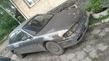 кронс: Mazda Cronos: 1992 г. — 2