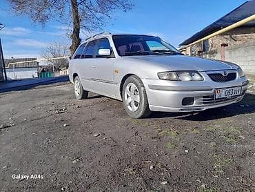 подкрыльник виндом: Mazda Capella: 1999 г., Бензин, Универсал — 3