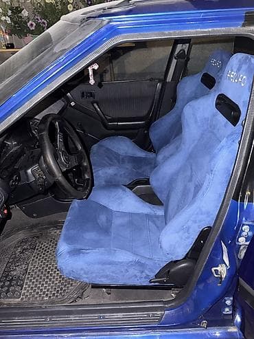 крыло демио: Mazda 323: 1992 г., Бензин, Хэтчбэк — 8