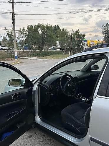 раф газ: Volkswagen Passat: 2001 г., 1.8 л, Автомат, Бензин, Универсал — 8