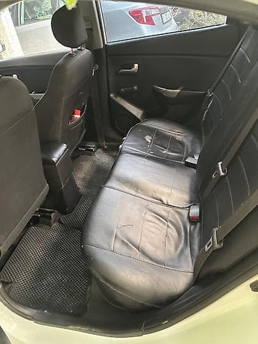 Kia Rio: 2016 г., 1.4 л, Кол менен иштөөчү, Бензин, Седан — 7