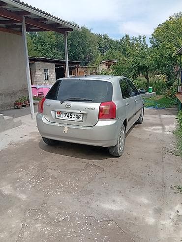 70: Toyota Corolla: 2003 г., 1.6 л, Механика, Бензин, Хэтчбэк — 1