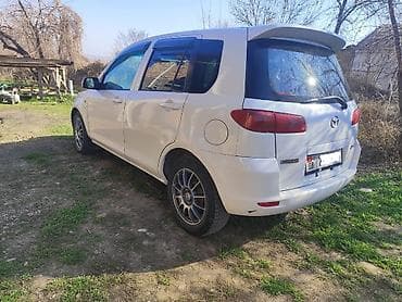 e500 124: Mazda Demio: 2003 г., 1.3 л, Автомат, Бензин, Хэтчбэк — 6