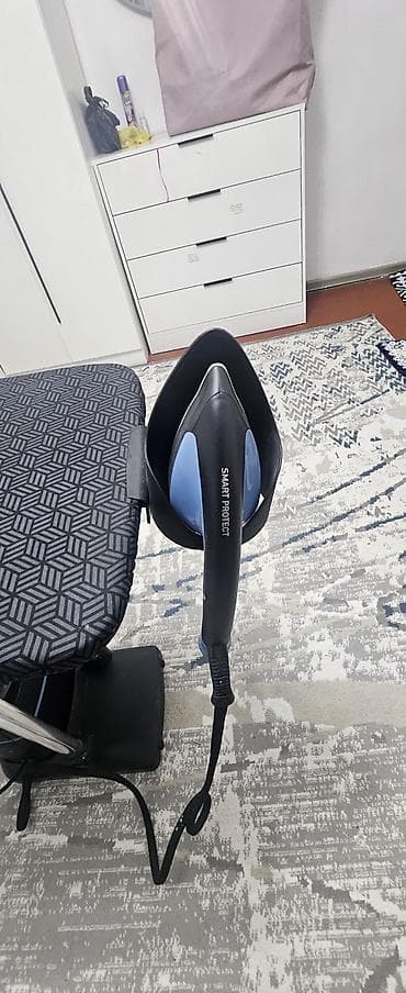 Для кафе, ресторанов: Гладильная система с парогенератором и вертикальной доской Tefal. - — 6